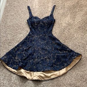 Blue and tan with gold interior dress.